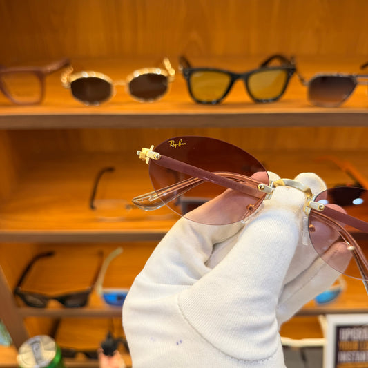 Ray Ban oval pink shade golden frame-less Premium Sunglass